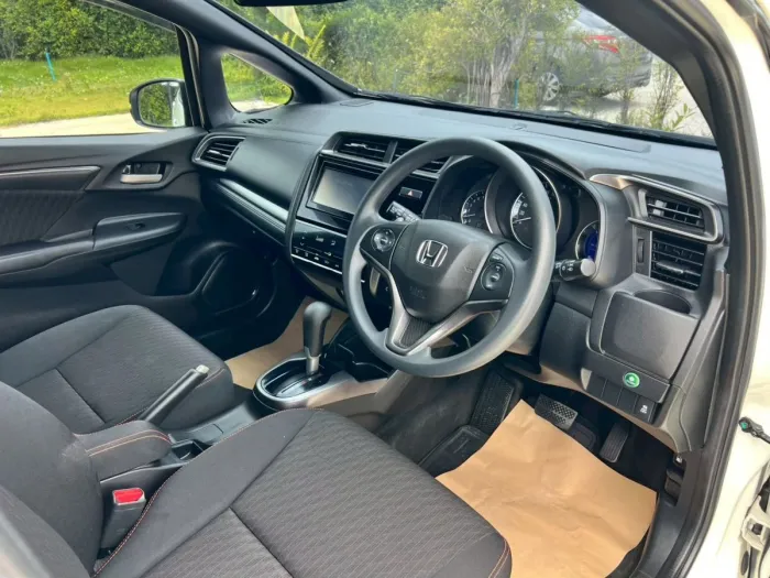 Front view of Honda Jazz 1.5 RS year 2019 white color used car in Hatyai รูปที่ 26