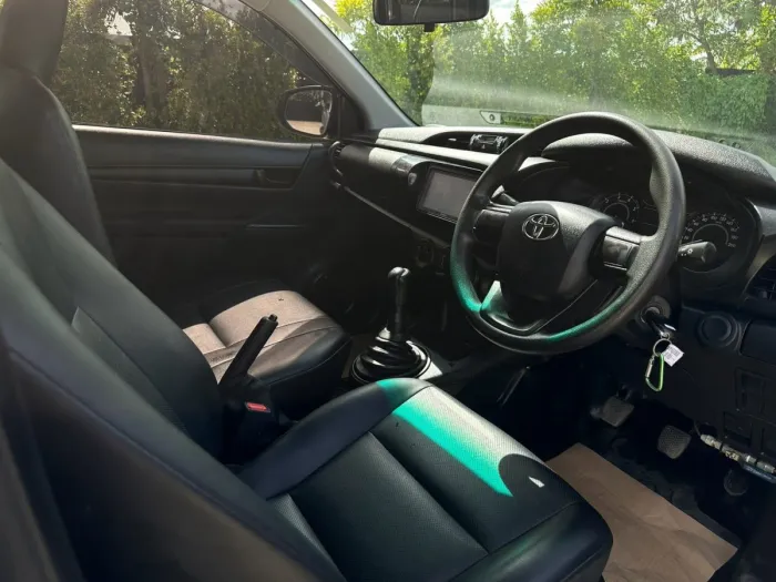 Front view of Toyota Hilux Revo Single Cab 2.8 Entry year 2023 silver color used car with cargo rack in Hatyai รูปที่ 13