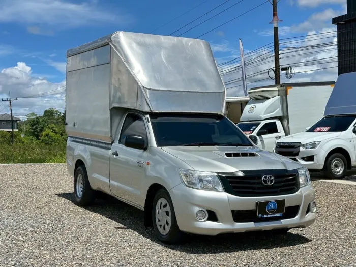 Front view of Toyota Hilux Vigo Champ Single Cab 3.0 J year 2012 silver color used car with cargo box in Hatyai