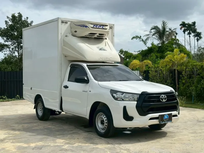 Front view of Toyota Hilux Revo Single Cab 2.4 Entry year 2022 white color used car with freezer box in Hatyai